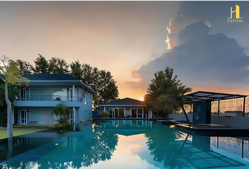 Luxury farmhouse land in Jewar near Noida International Airport – H Capital real estate investment in NCR